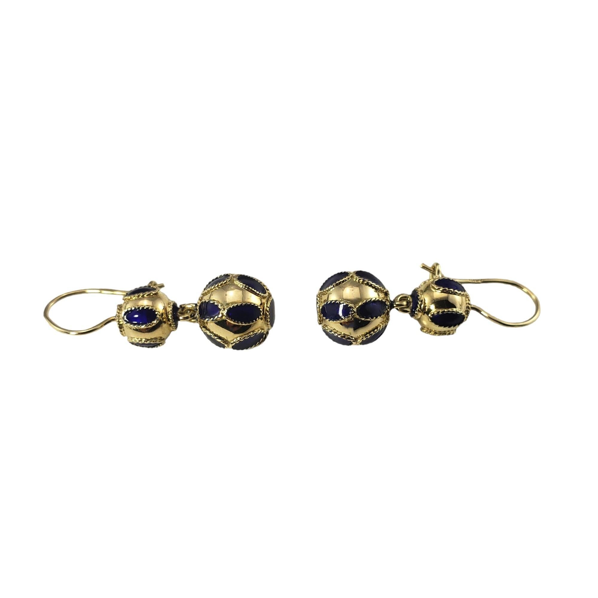 Vintage 14 Karat Yellow Gold and Enamel Dangle Earrings-

These elegant drop earrings are crafted in beautifully detailed 14K yellow gold and accented with blue enamel.

Size:  30.4 mm x 10.2 mm

Weight: 3.5 gr./ 2.3 dwt.

Stamped:  585

Very good