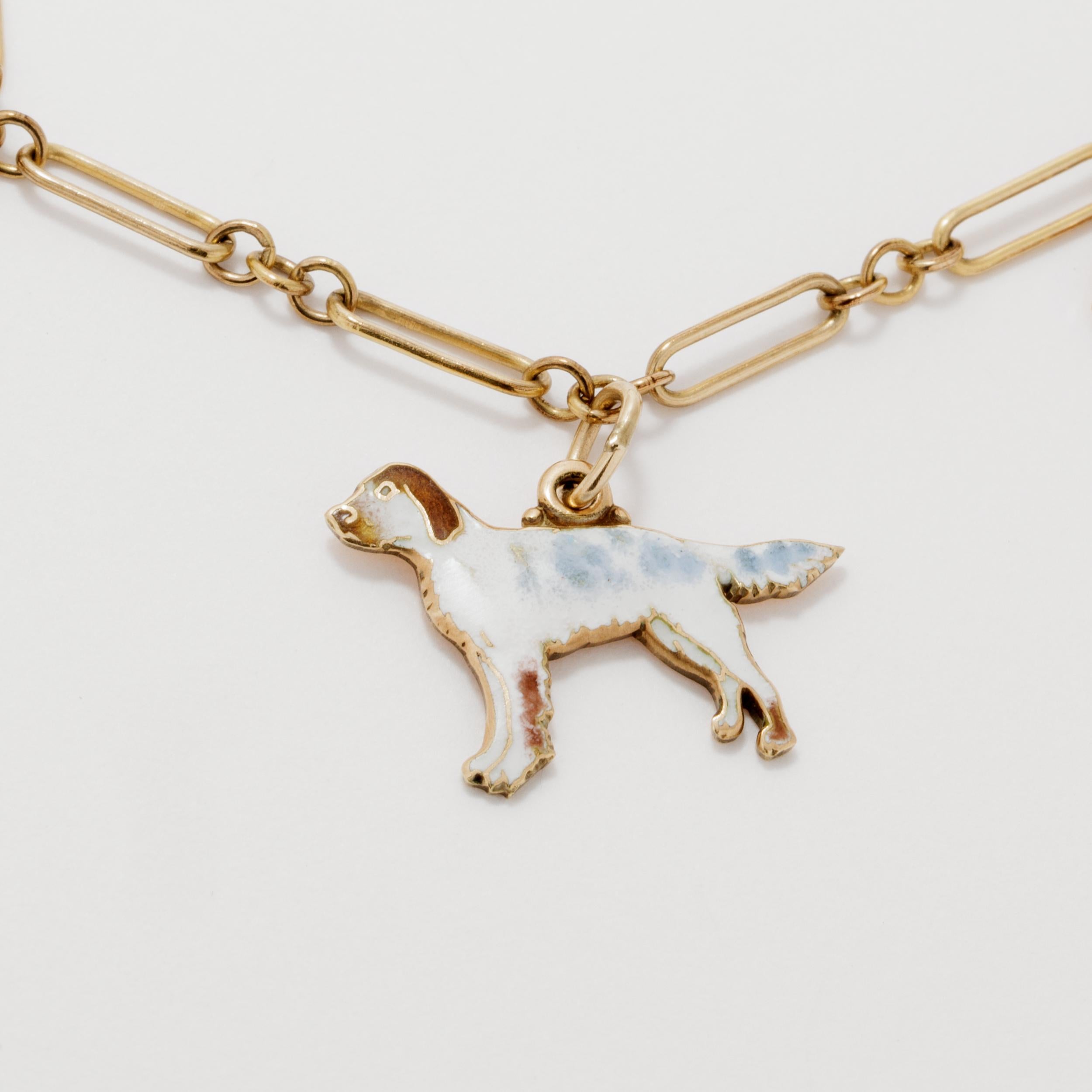 Vintage 14 Karat Yellow Gold and Enamel Dog Motif Charm Bracelet In Good Condition For Sale In New York, NY