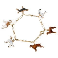 Vintage 14 Karat Yellow Gold and Enamel Dog Motif Charm Bracelet