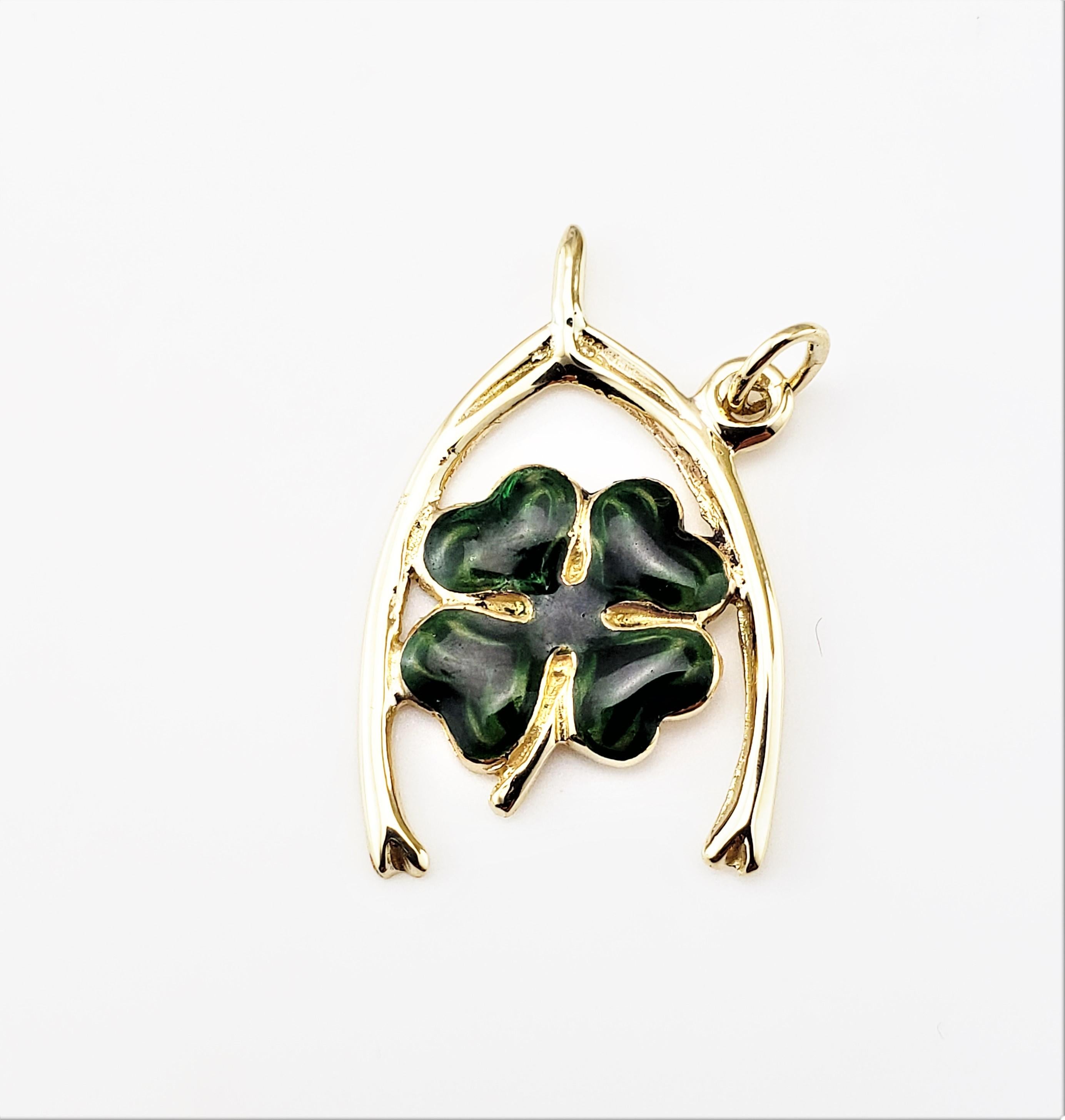 Vintage 14 Karat Yellow Gold and Enamel Shamrock Wishbone Pendant-

The ultimate good luck charm!

This lovely pendant features a green enamel shamrock inside a lucky wishbone crafted in 14K yellow gold.

Size:   26 mm  x   16 mm

Weight:  1.7 dwt./