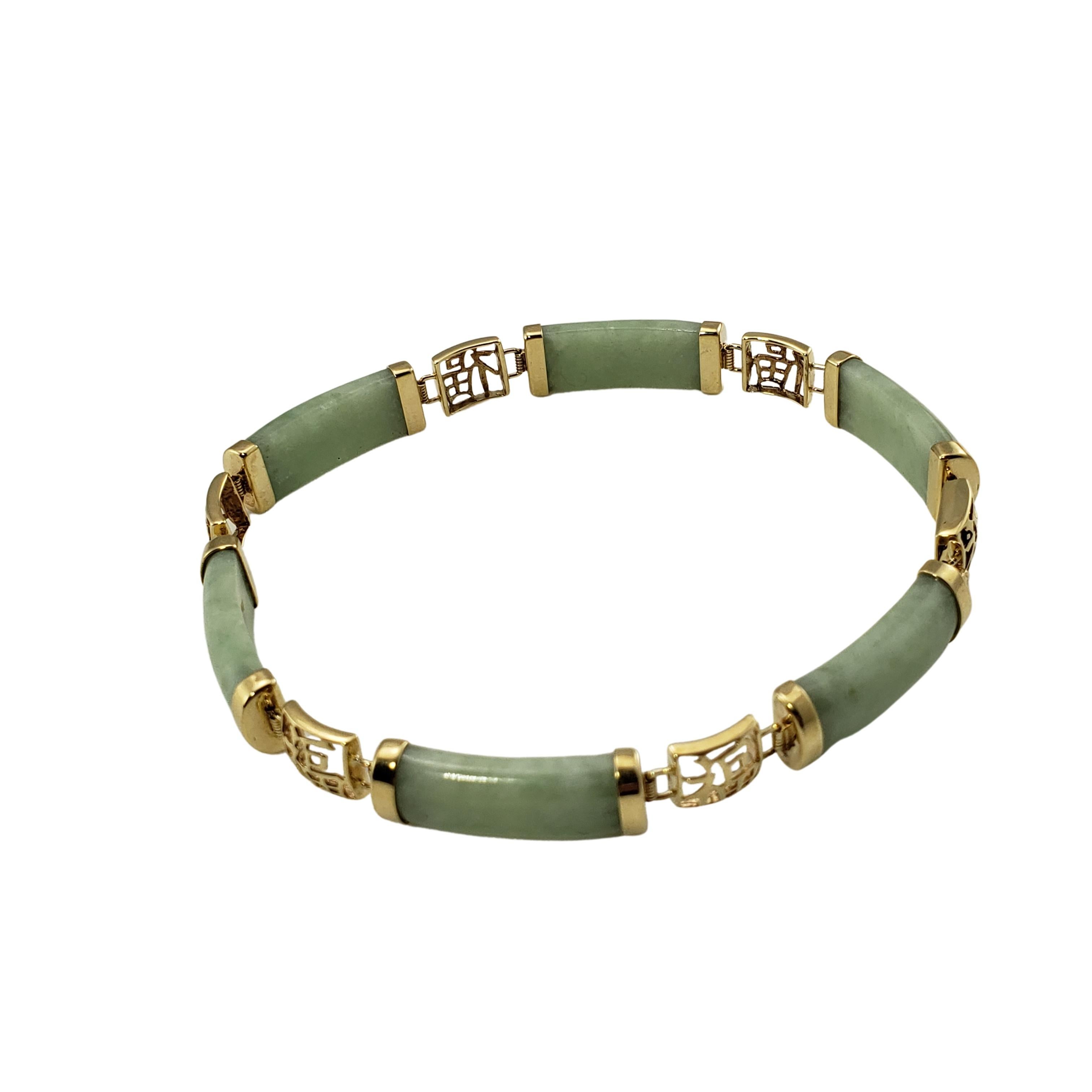 Armband aus 14 Karat Gelbgold und Jade (Cabochon)