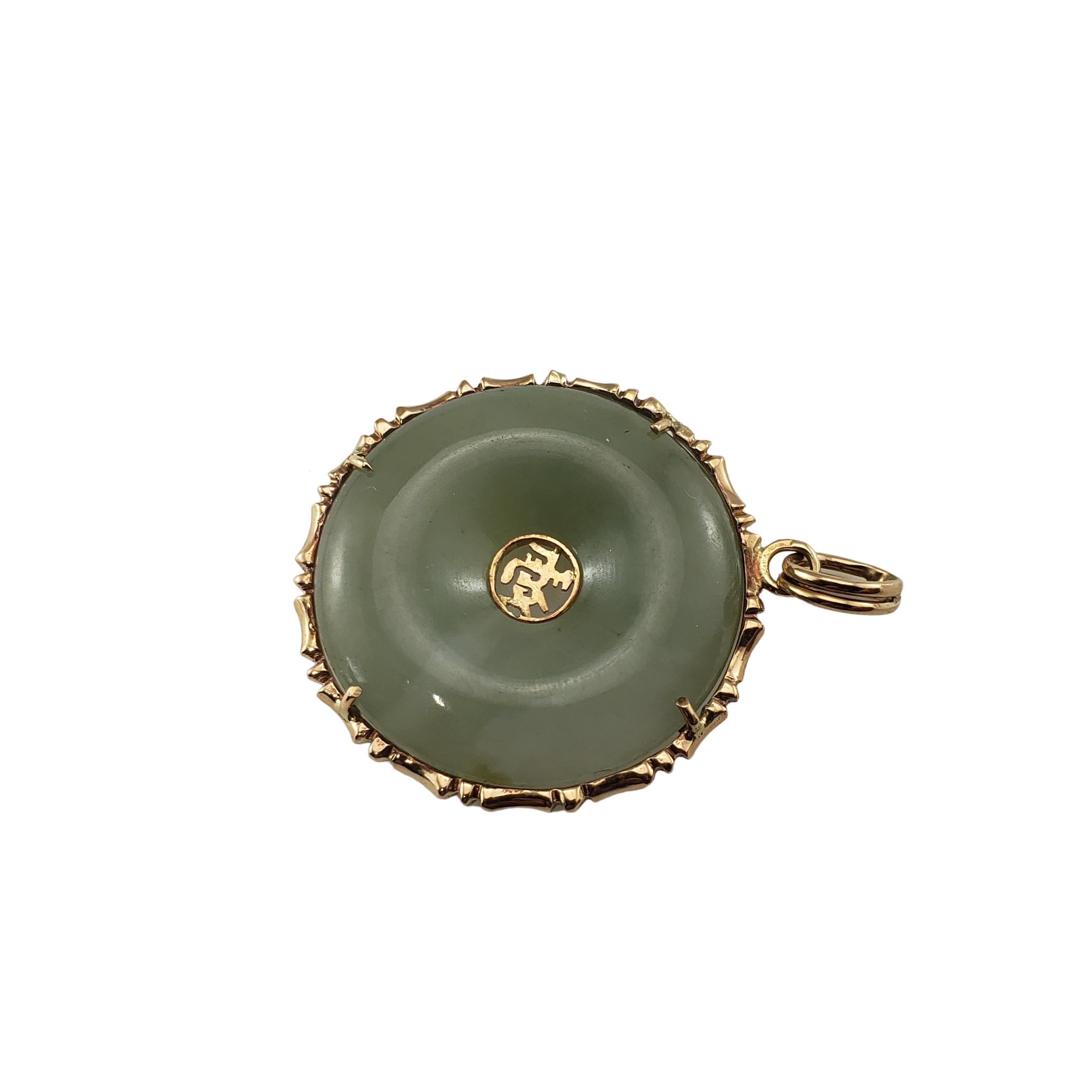 Vintage 14 Karat Yellow Gold and Jade Chinese Good Luck Pendant-

This lovely pendant features the Chinese characters for good luck and fortune. Crafted in beautifully detailed green jade and 14K yellow gold.

Size: 29 mm x 26 mm

Weight: 3.9 dwt. /
