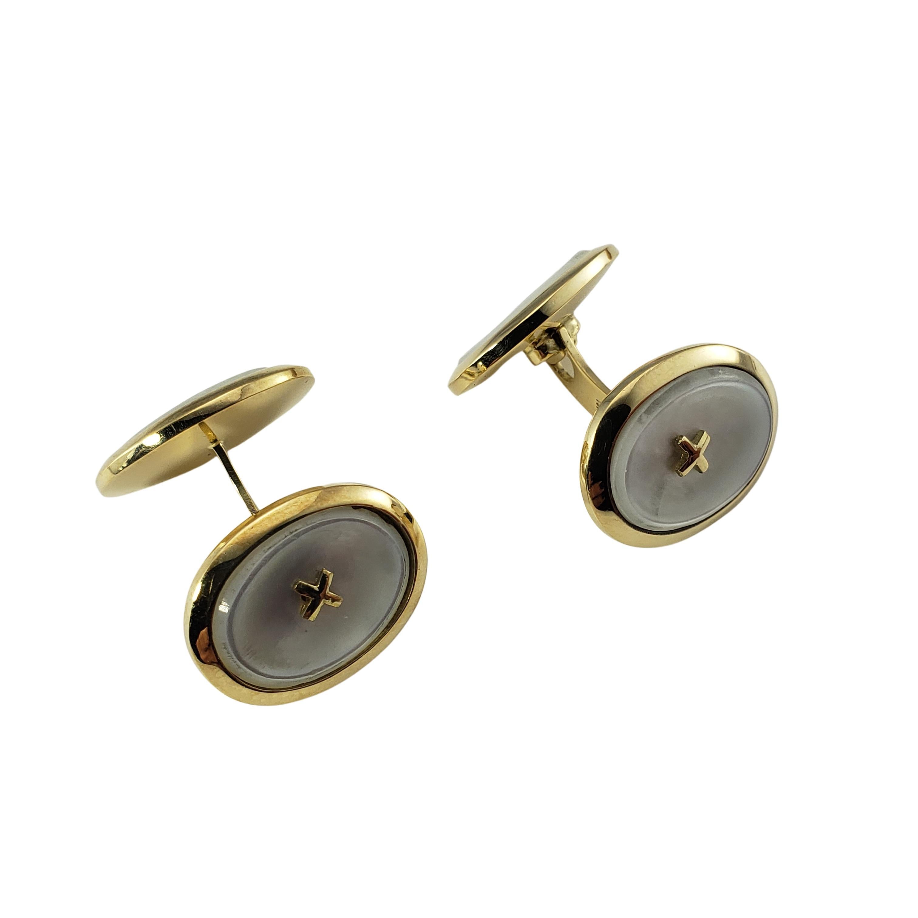 Vintage 14 Karat Yellow Gold and Mother of Pearl Cufflinks-

These elegant cufflinks are crafted in beautifully detailed 14K yellow gold and mother of pearl.

Matching buttons:  RL-00010248

Size: 18 mm x 15 mm

Weight:  8.8 dwt. /  13.8