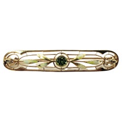 Vintage 14 Karat Yellow Gold and Peridot Bar Brooch / Pin Vintage 14 Karat Yellow Gold and Peridot Bar Brooch / Pin