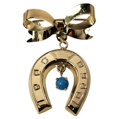 14 Karat Yellow Gold and Turquoise Horseshoe Brooch / Pin