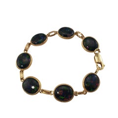 Schwarzes Opal-Armband aus 18 Karat Gelbgold