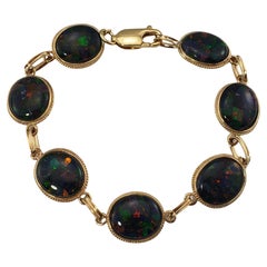 Bracelet en or jaune 14 carats avec opale noire