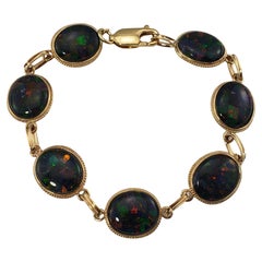 14 Karat Yellow Gold Black Opal Bracelet