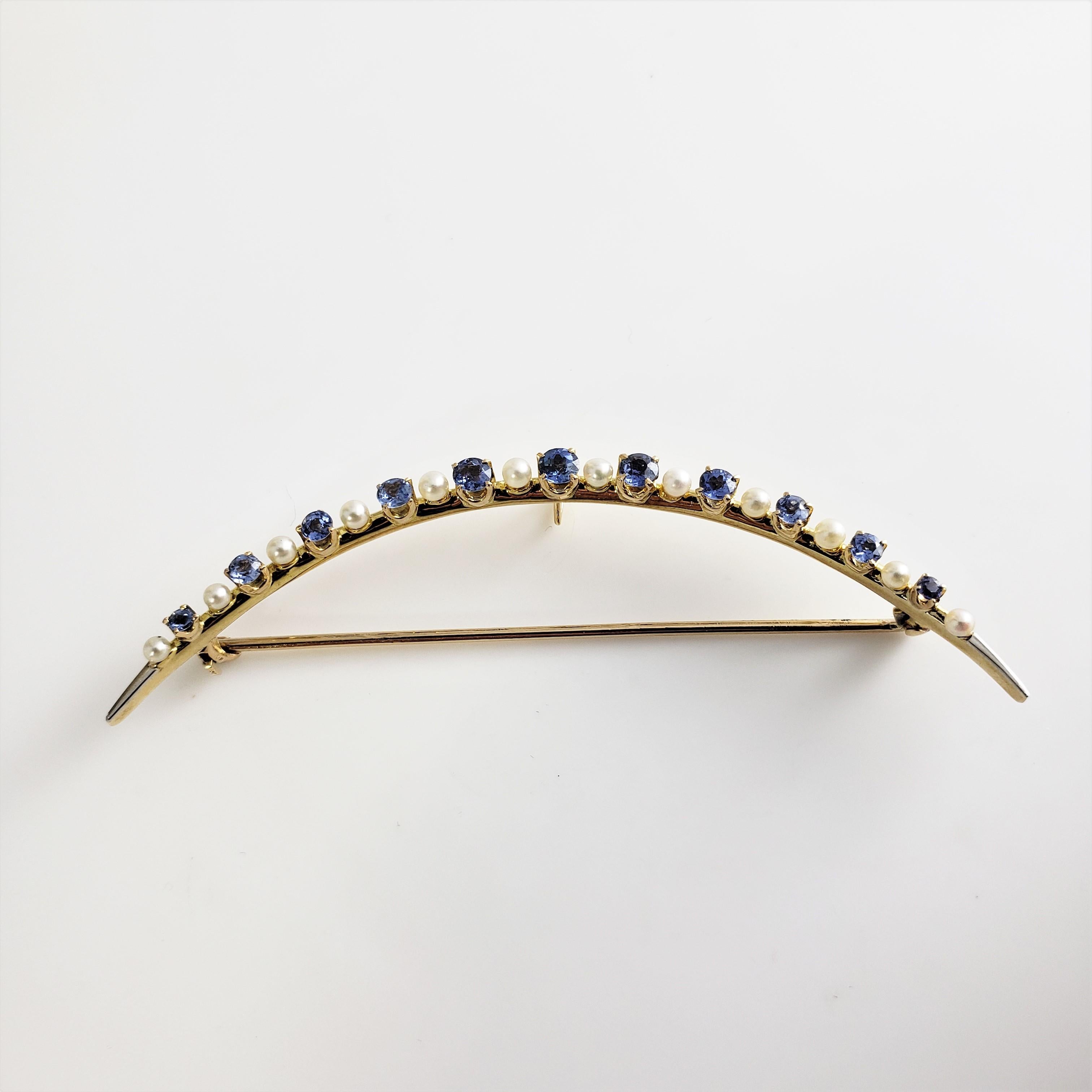 14 Karat Yellow Gold Blue Zircon and Pearl Crescent Moon Brooch/Pin GAI Certified-

This stunning crescent moon pin features 11 blue zircon stones and 12 white pearls (3 mm each) set in beautifully detailed 14K yellow gold.  Width:  3 mm.

Size: 
