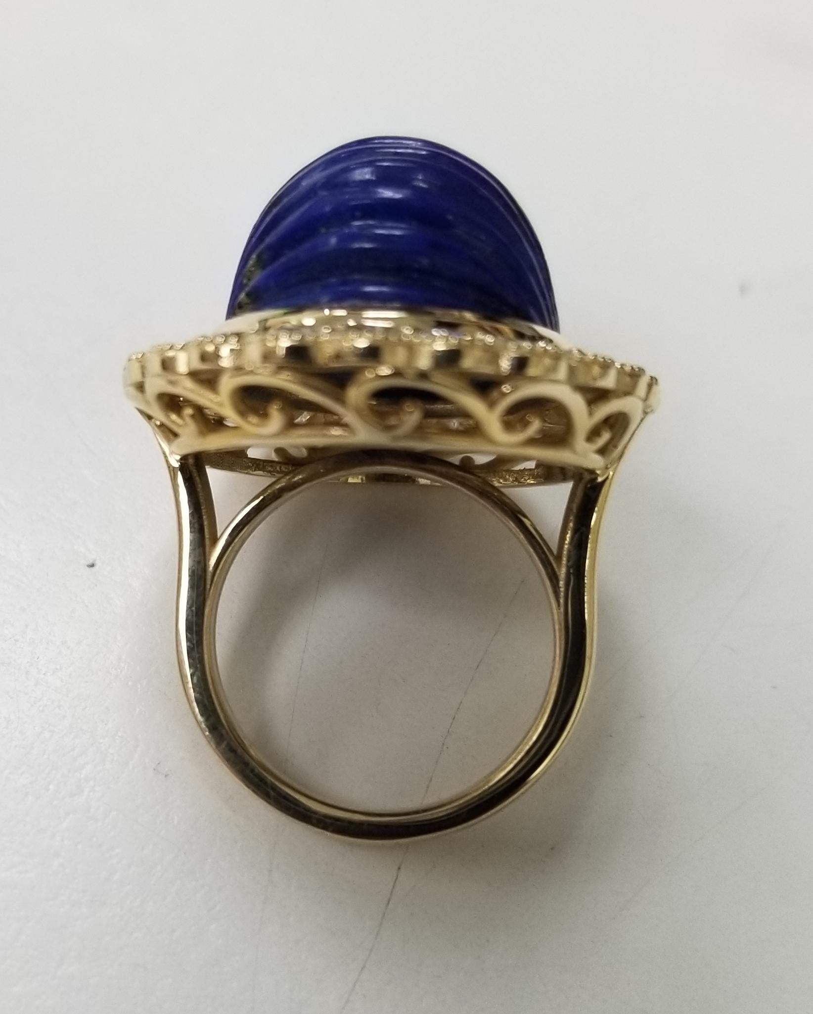 Oval Cut Vintage 14 Karat Yellow Gold Carved Lapis Lazuli and Diamond Ring For Sale