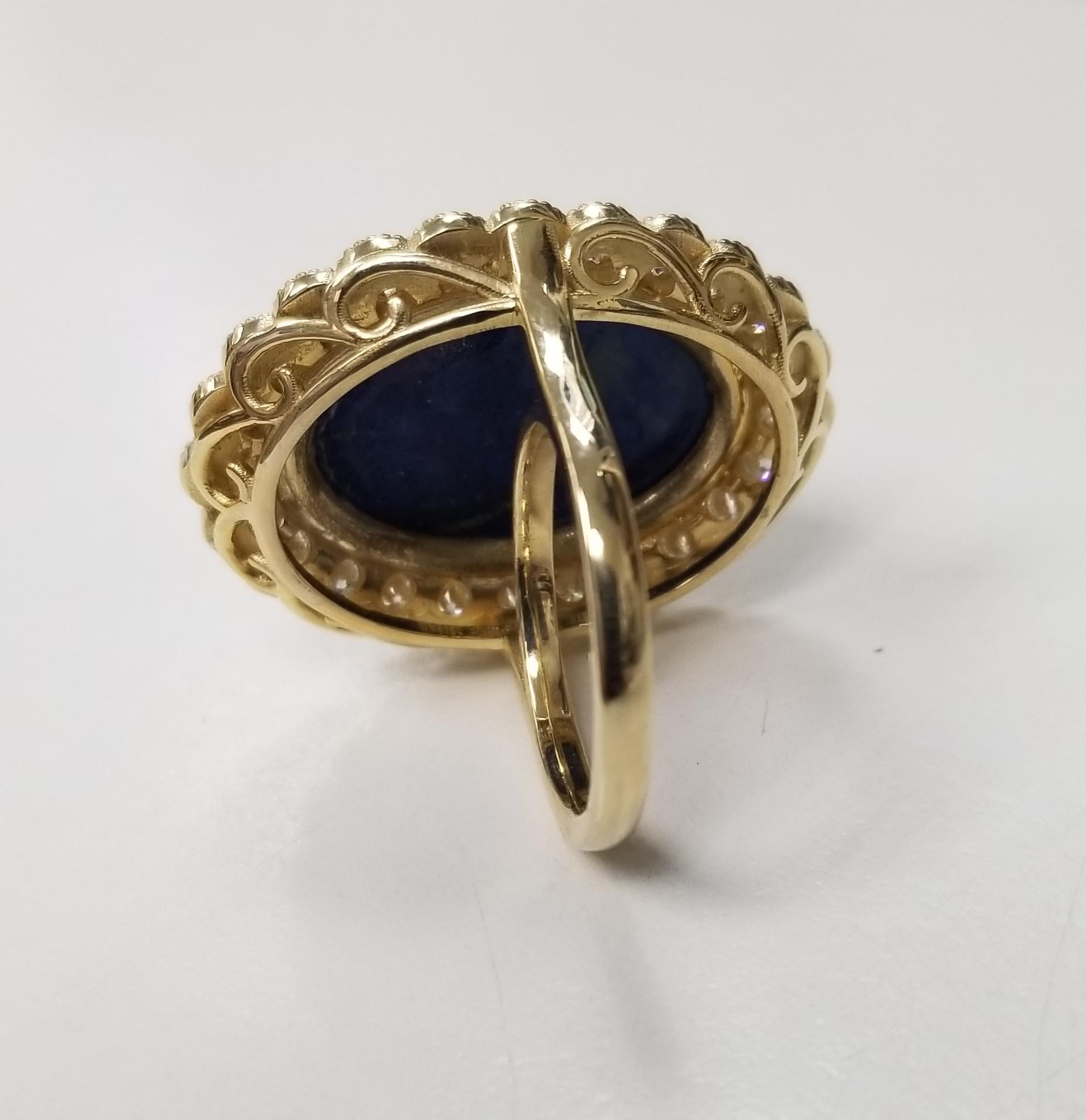 Vintage 14 Karat Yellow Gold Carved Lapis Lazuli and Diamond Ring In Excellent Condition For Sale In Los Angeles, CA