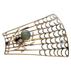 Vintage 14 Karat Yellow Gold Cat’s Eye Quartz and Diamond Spider Brooch