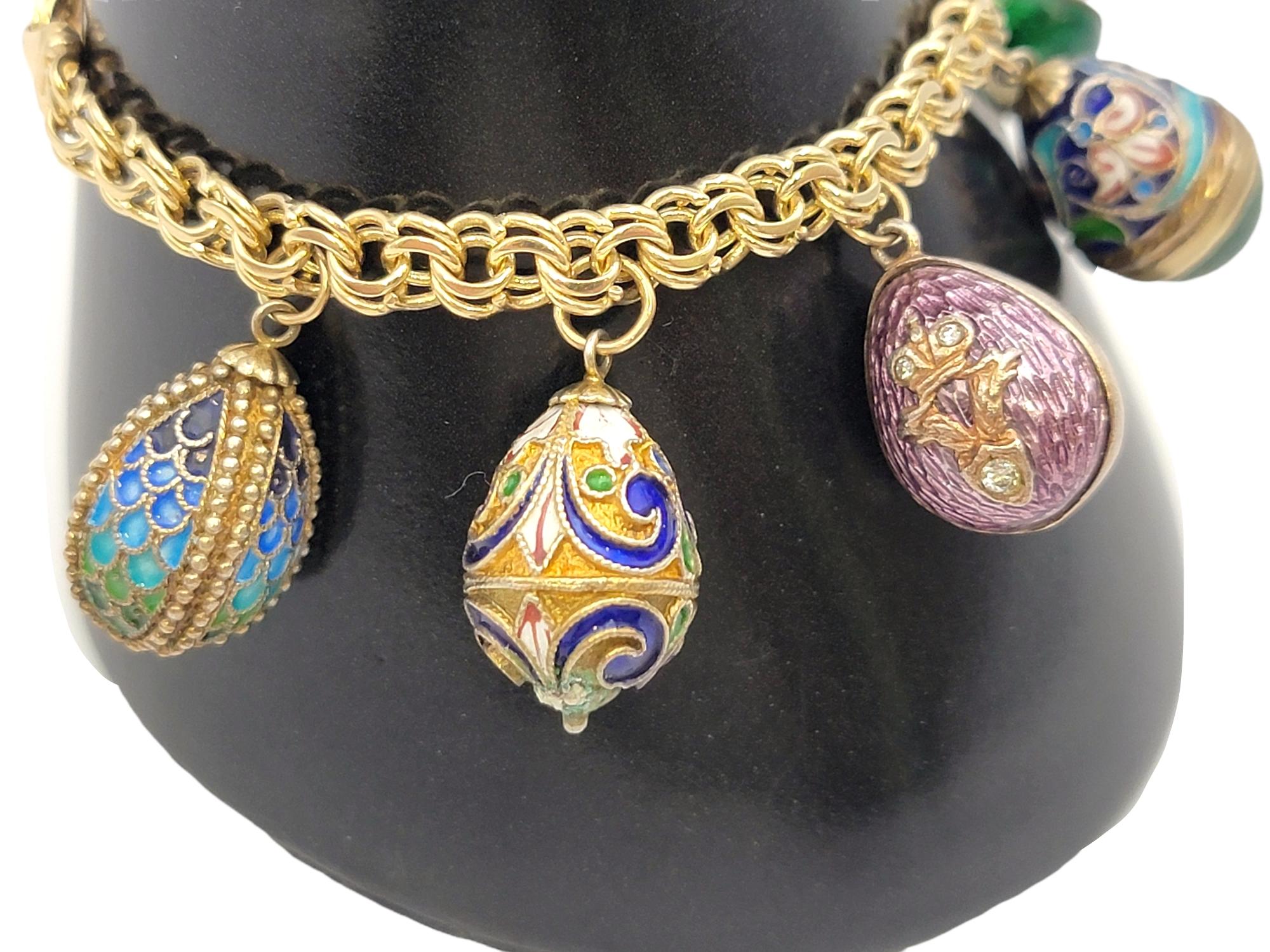 Vintage 14 Karat Yellow Gold Charm Bracelet with 7 Colorful Enamel Egg Charms For Sale 1