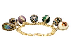 Vintage 14 Karat Yellow Gold Charm Bracelet with 7 Colorful Enamel Egg Charms