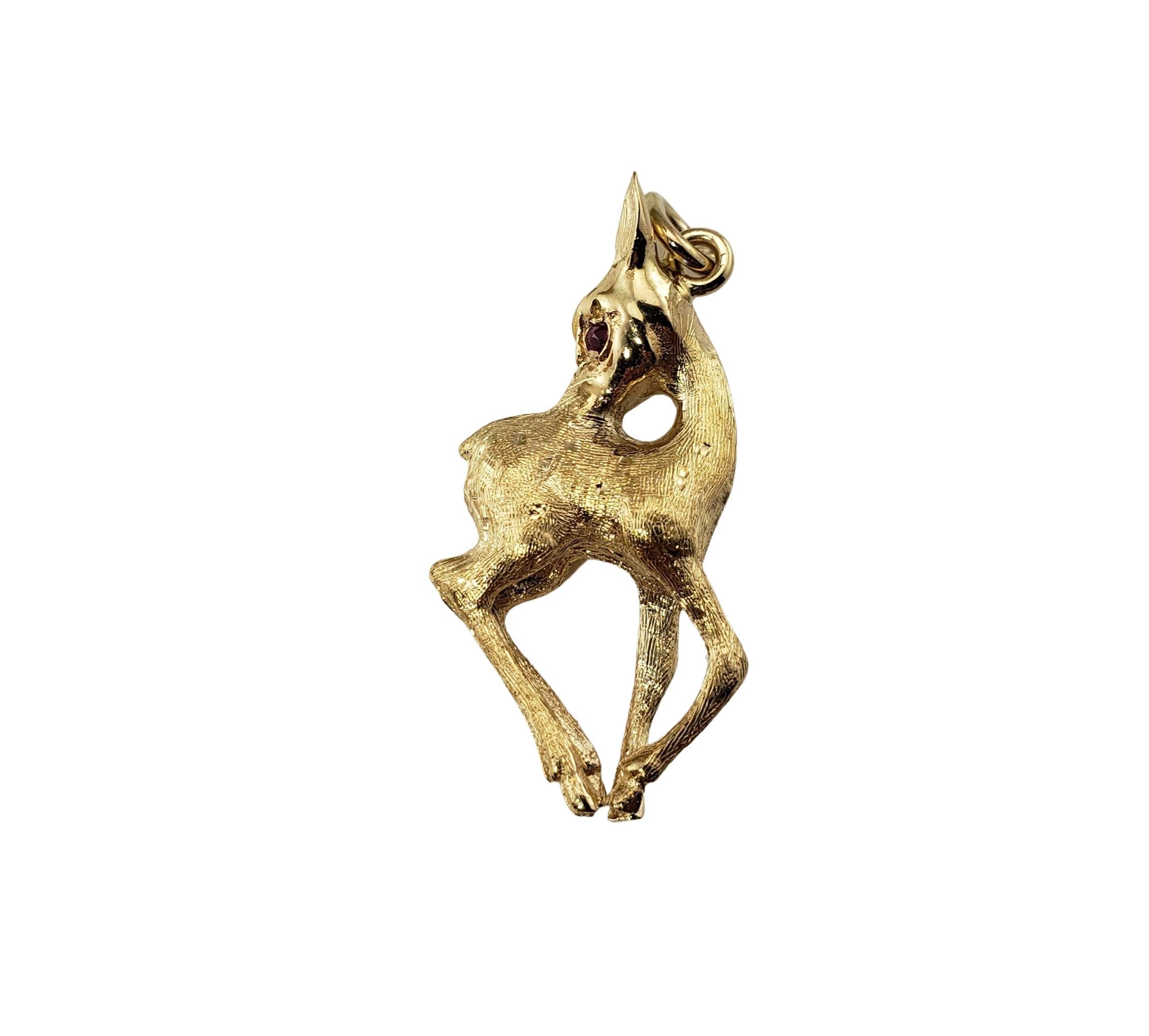 14 Karat Yellow Gold Deer Charm-

This adorable deer charm is crafted in beautifully detailed 14K yellow gold and accented with two synthetic ruby eyes.

Size:  25 mm x 14 mm

Weight:  2.3 dwt. /  3.6 gr.

Stamped: 14K

*Chain not included.

Very