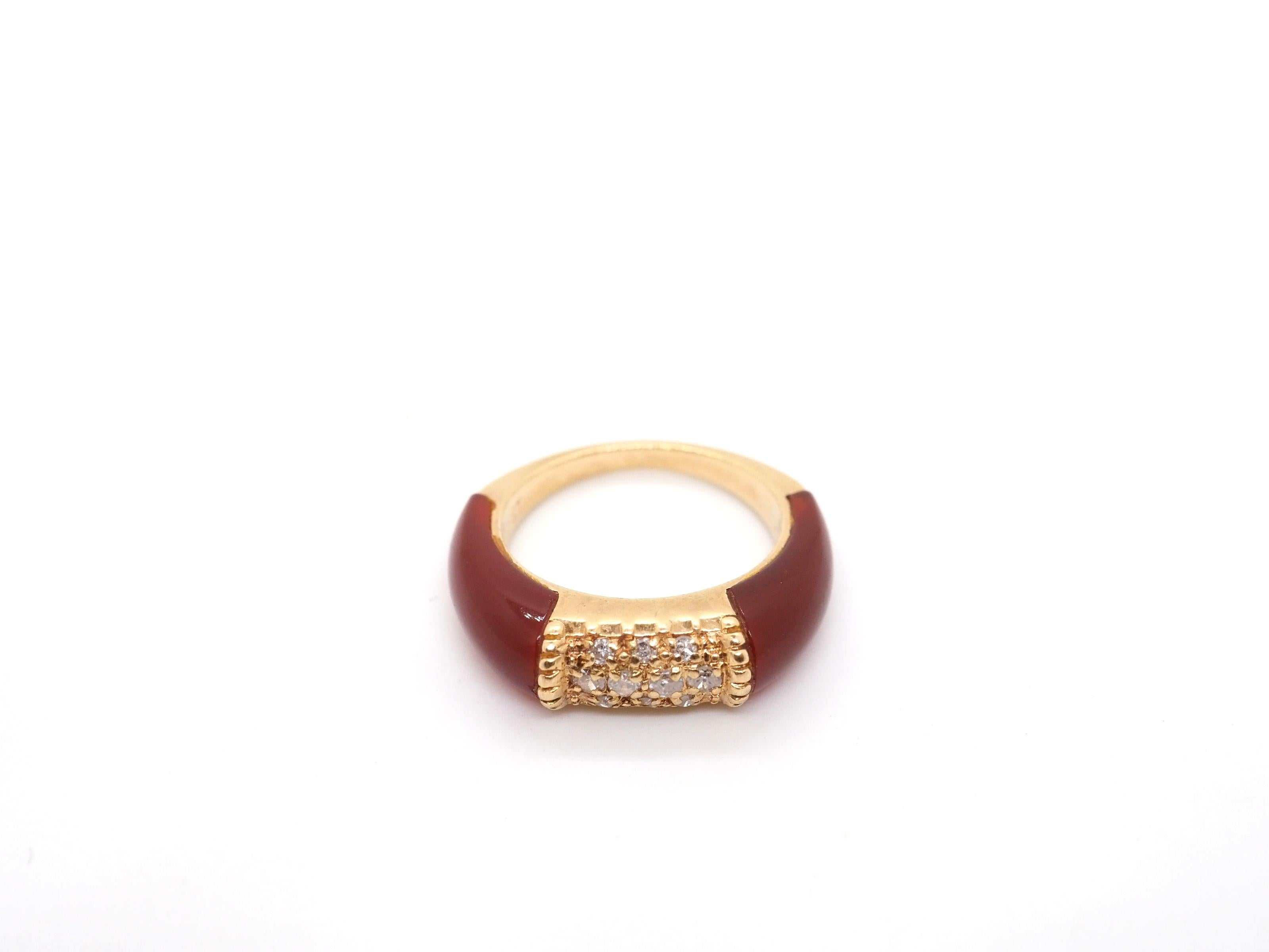 Step into the world of vintage elegance with this exquisite Vintage Ring crafted in 14k yellow gold. This stunning piece captures the essence of a bygone era, showcasing intricate details and a timeless design.

The vintage-inspired setting is