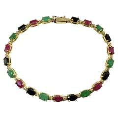 14 Karat Yellow Gold Diamond, Emerald, Sapphire and Ruby Bracelet