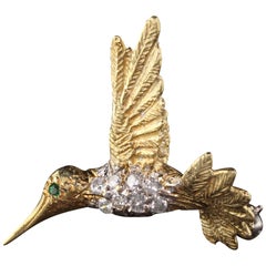 Vieille broche colibri en or jaune 14 carats avec diamant