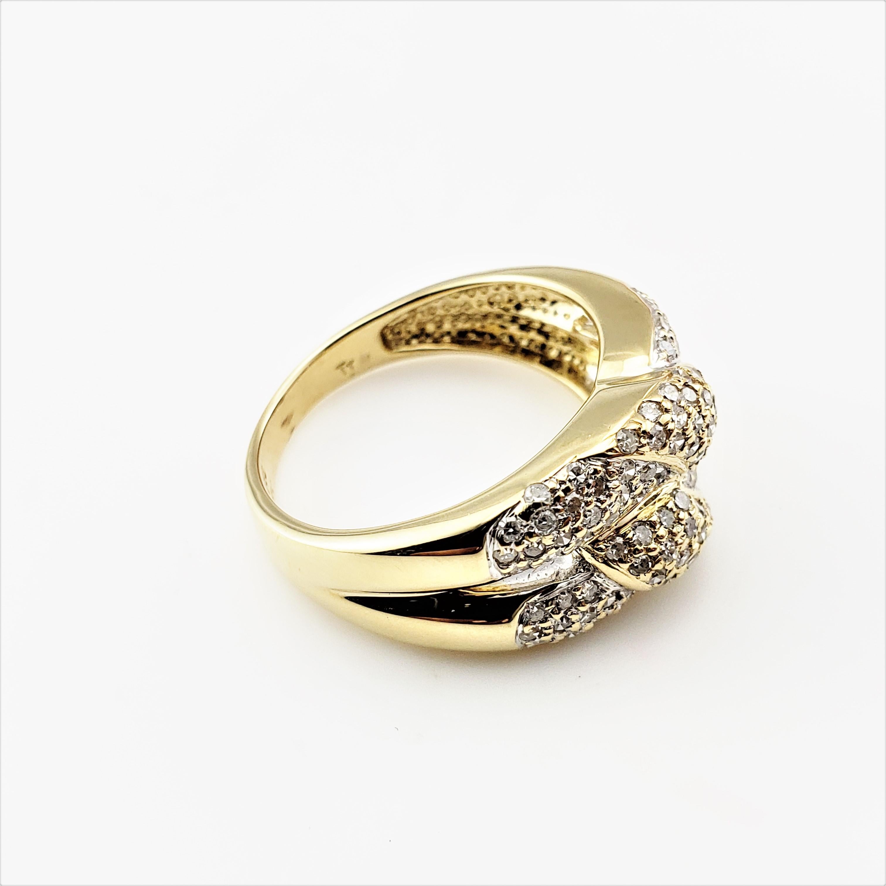 Taille ronde Bague vintage en or jaune 14 carats avec nœud de diamant en vente
