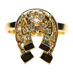 Retro 14 Karat Yellow Gold Diamond ‘Lucky’ Horse Shoe Spinner Ring, circa 1990