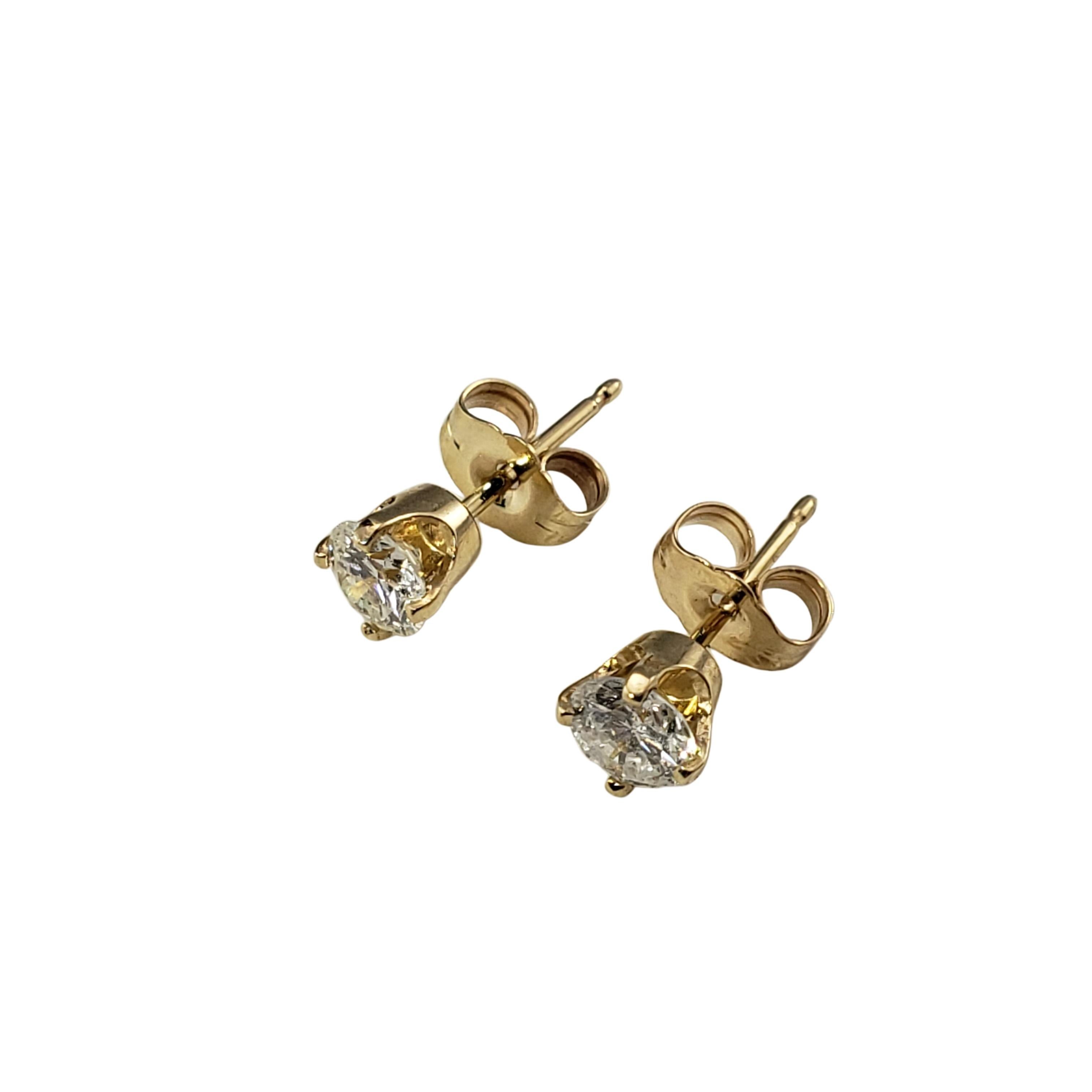 Brilliant Cut 14 Karat Yellow Gold Diamond Stud Earrings .60 TCW. For Sale