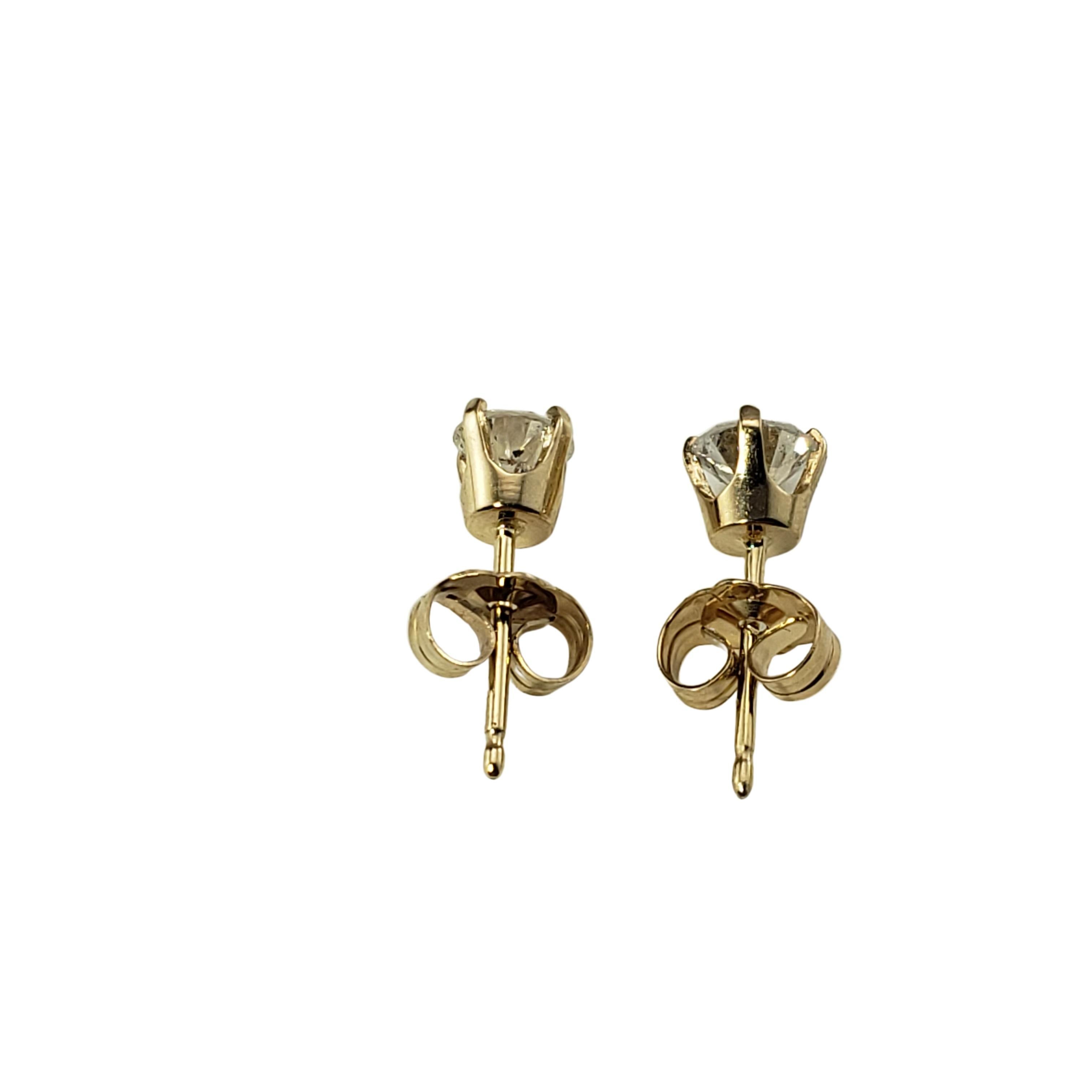 Women's 14 Karat Yellow Gold Diamond Stud Earrings .60 TCW. For Sale