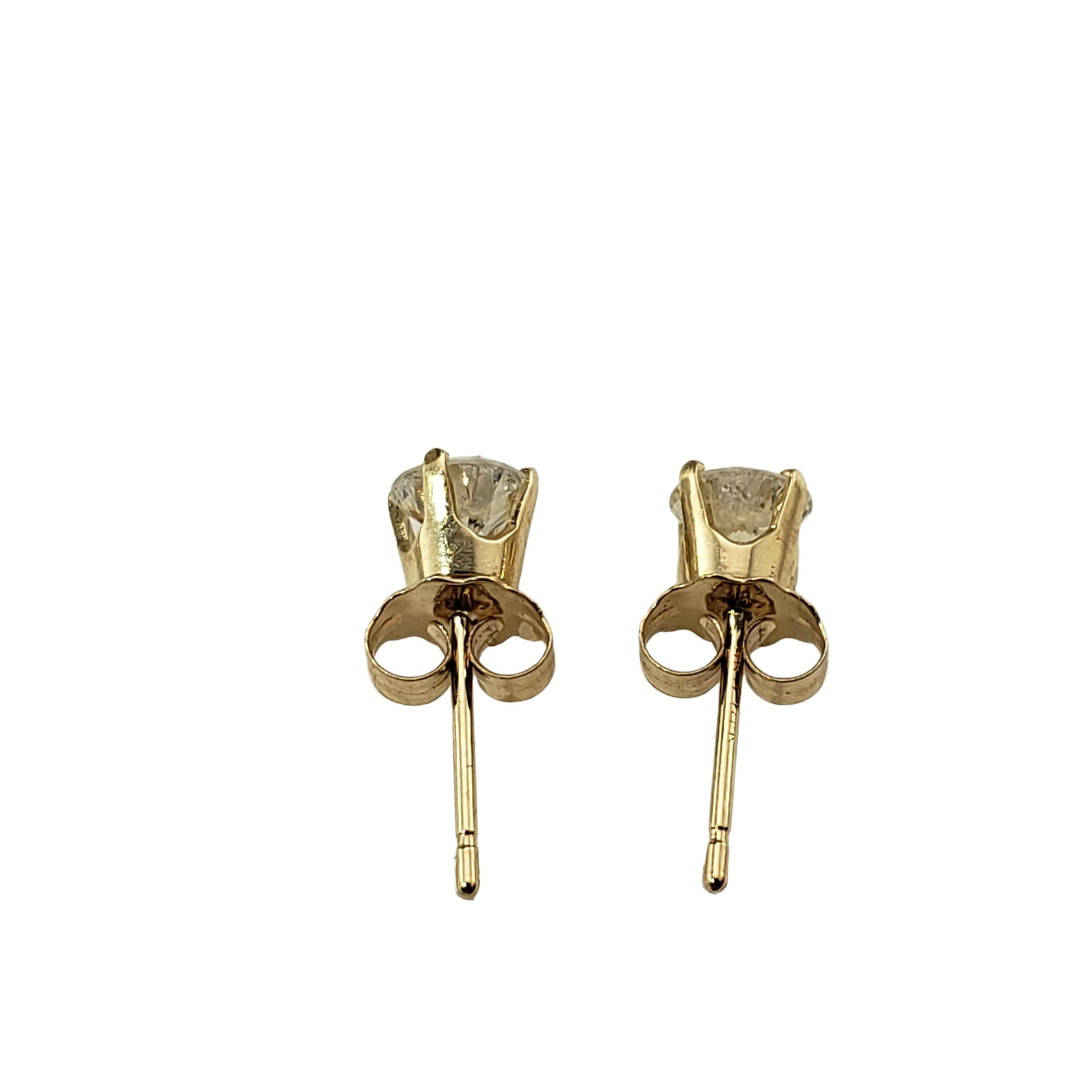 Women's 14 Karat Yellow Gold Diamond Stud Earrings .60 TCW.
