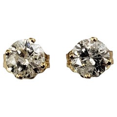 14 Karat Yellow Gold Diamond Stud Earrings .60 TCW.