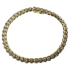 Tennisarmband aus 14 Karat Gelbgold mit Diamanten #15334, Vintage