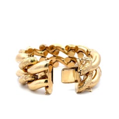 Bracelet vintage en or jaune 14 carats à maillons gourmette gravés, 95 grammes