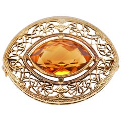Antique 14 Karat Yellow Gold Filigree Framed Brooch with Marquise Citrine