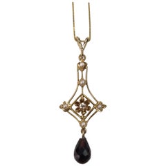 Vintage 14 Karat Yellow Gold Garnet and Diamond Pendant