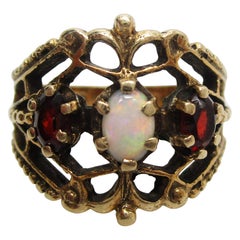 Vintage 14 Karat Yellow Gold Garnet and White Opal Filigree Ring