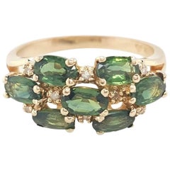 Vintage 14 Karat Yellow Gold Green Oval Cut Garnet and Diamond Ring