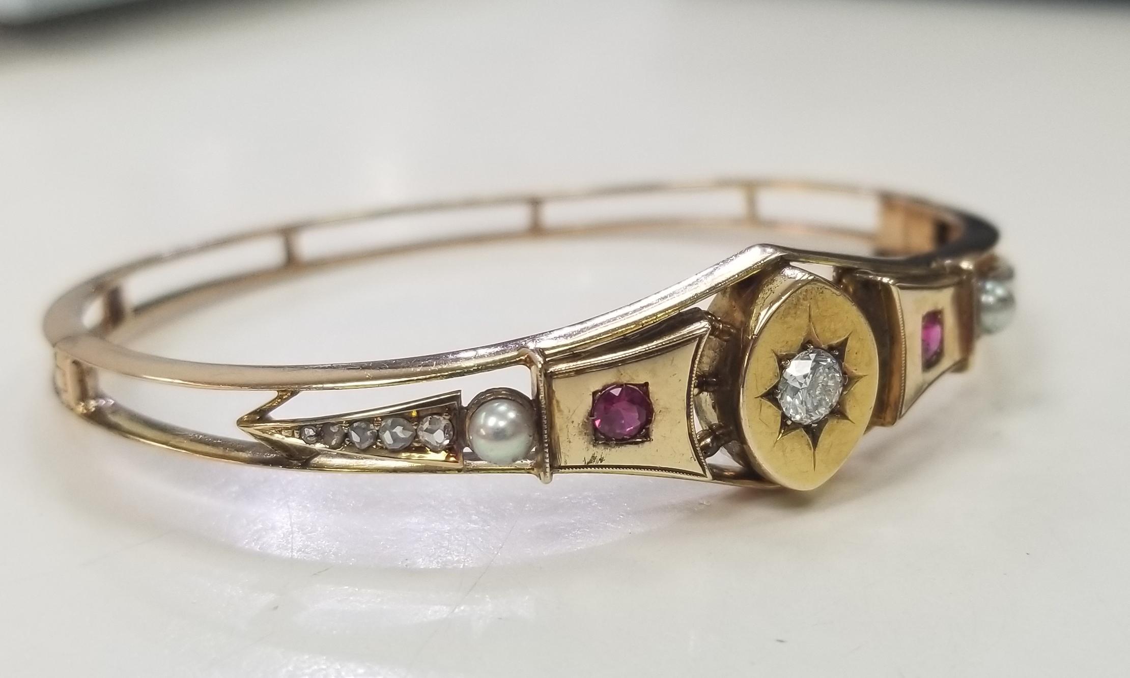 Vintage 14 Karat Yellow Gold Handmade Diamond Bangle Bracelet, containing 
Specifications:
    main stone: ROUND CUT DIAMONDS
    carat total weight: center diamond .25pts. color H and clarity SI2
   additional diamonds; 10 round diamonds weighing