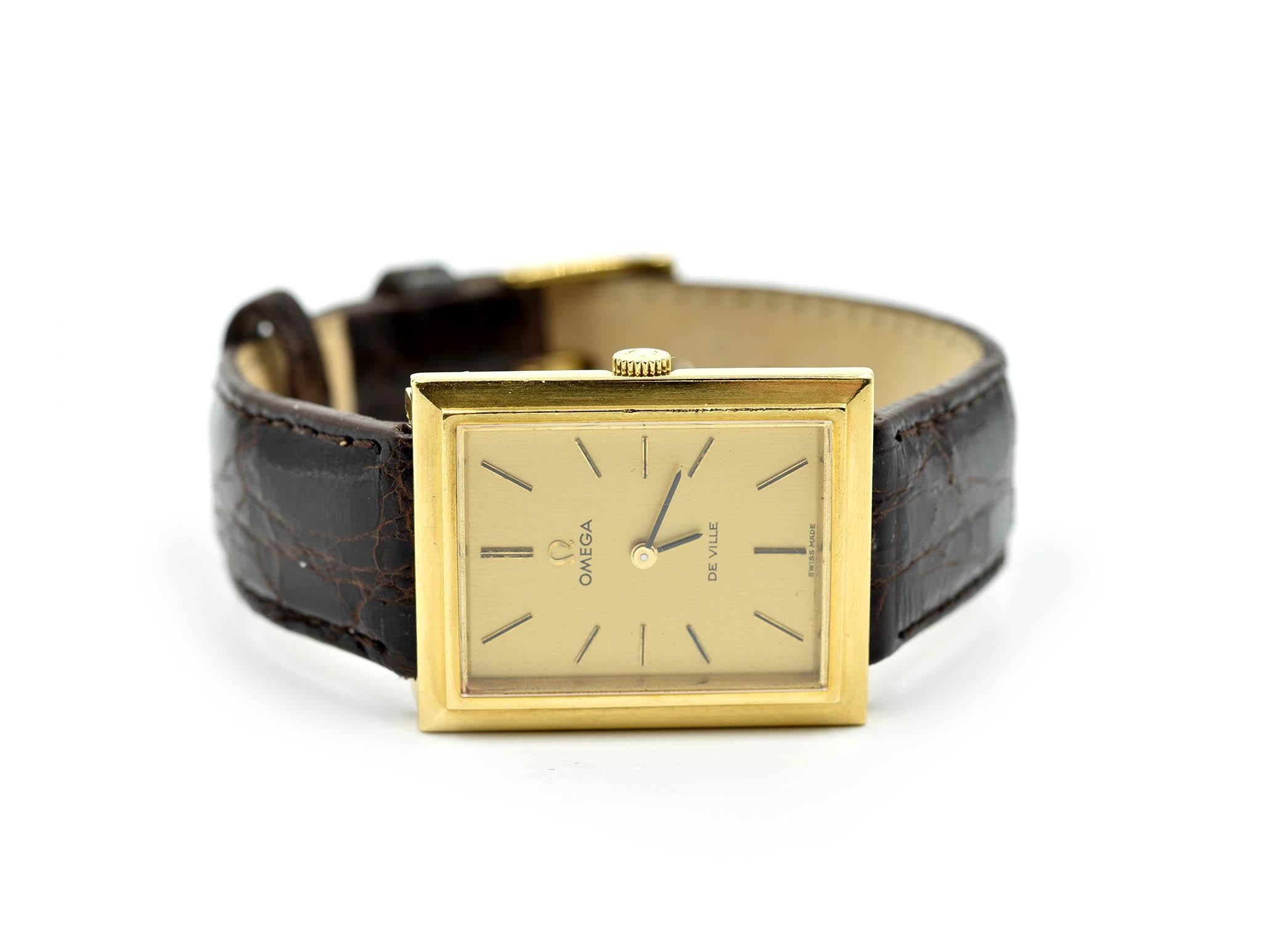 Movement: manual wind, movement number 39611645, caliber 625
Function: hours, minutes
Case: 24x39mm 14k yellow gold case, sapphire crystal
Band: generic black leather strap with gold tone Omega buckle *please note that band shows signs of wear, we
