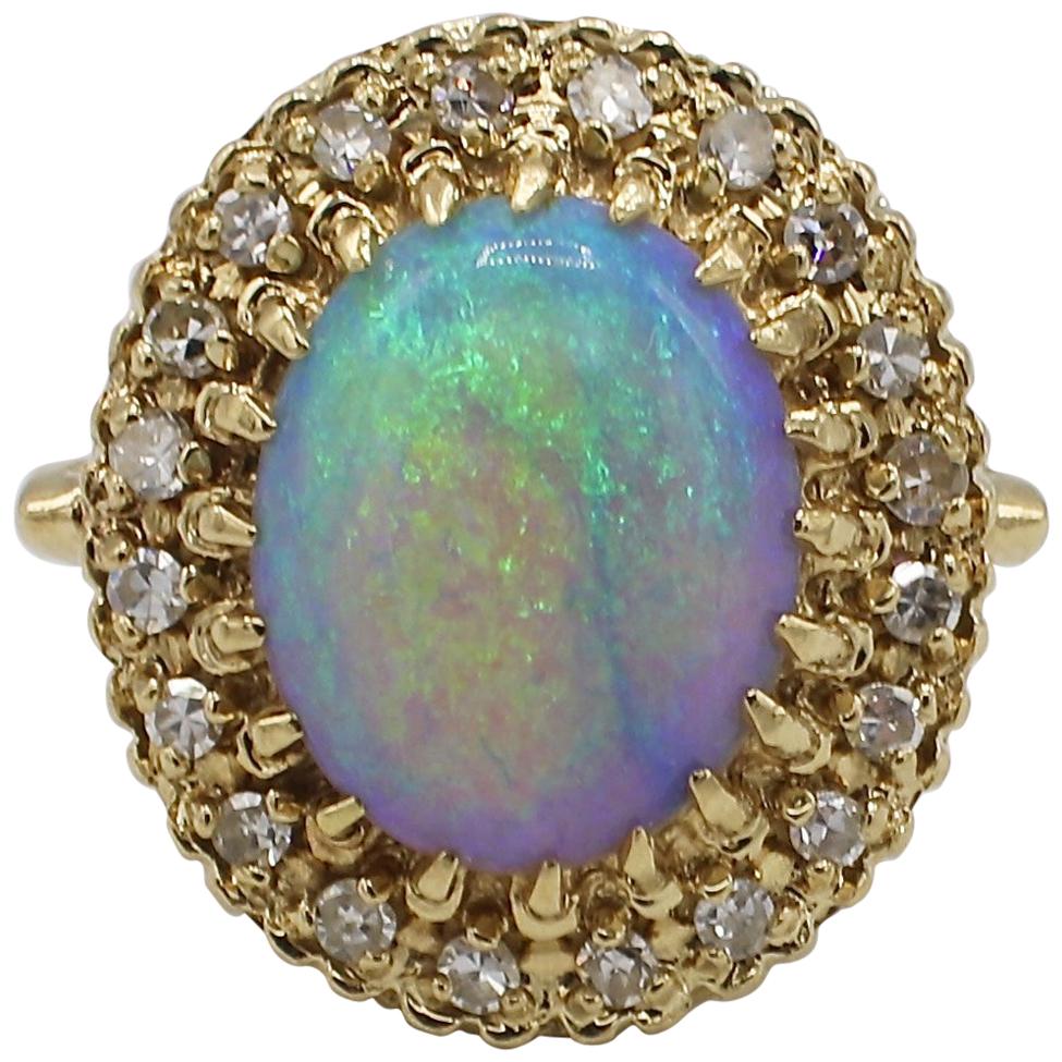 Vintage 14 Karat Yellow Gold Opal and Diamond Halo Cocktail Ring