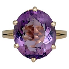 Anillo de cóctel vintage de amatista en oro amarillo de 14 quilates de talla ovalada