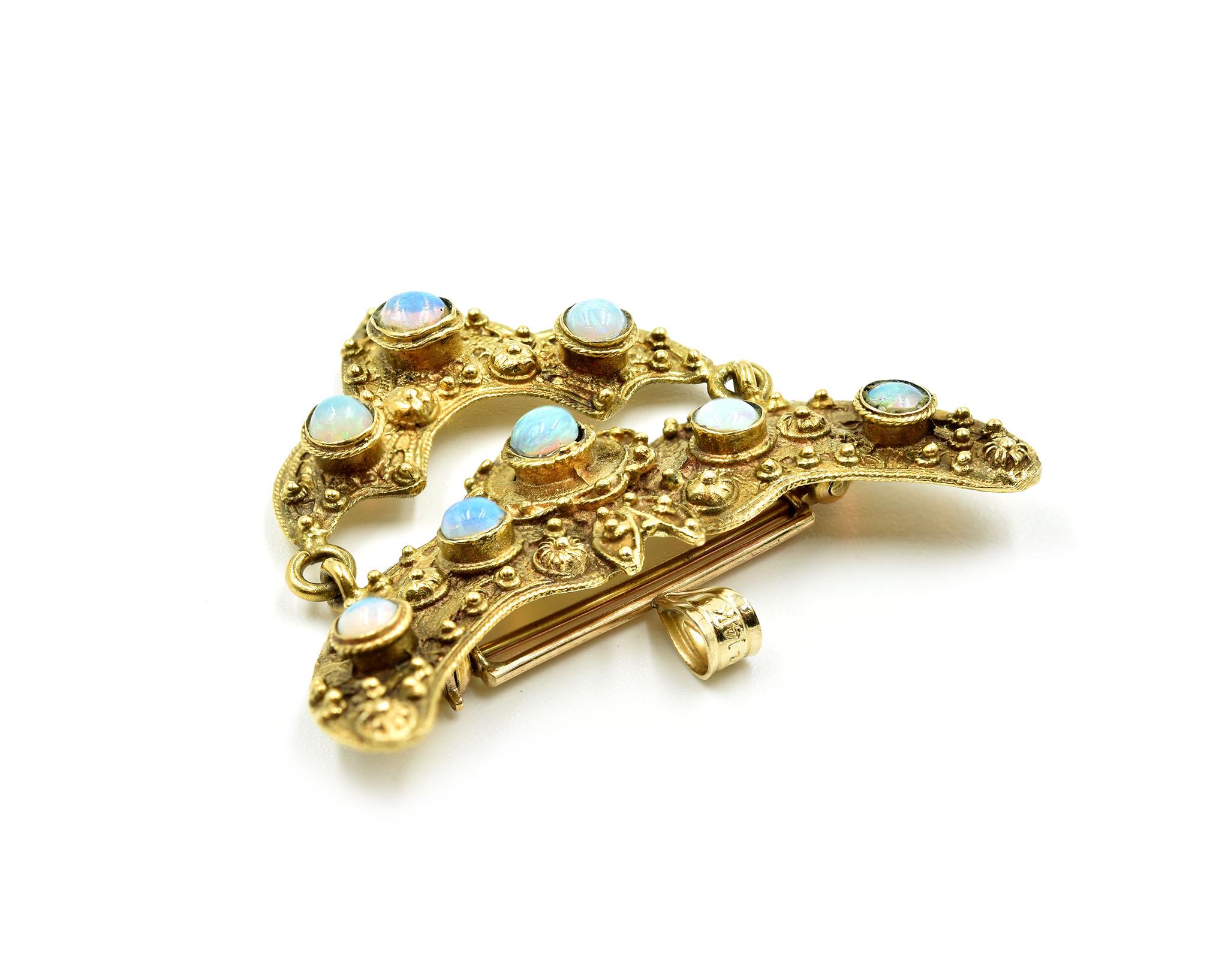 Designer: custom design
Material: 14k yellow gold
Dimensions: vintage opal pin is 1 1/4-inches long and 1 1/2-inches wide 
Weight: 5.90 grams

