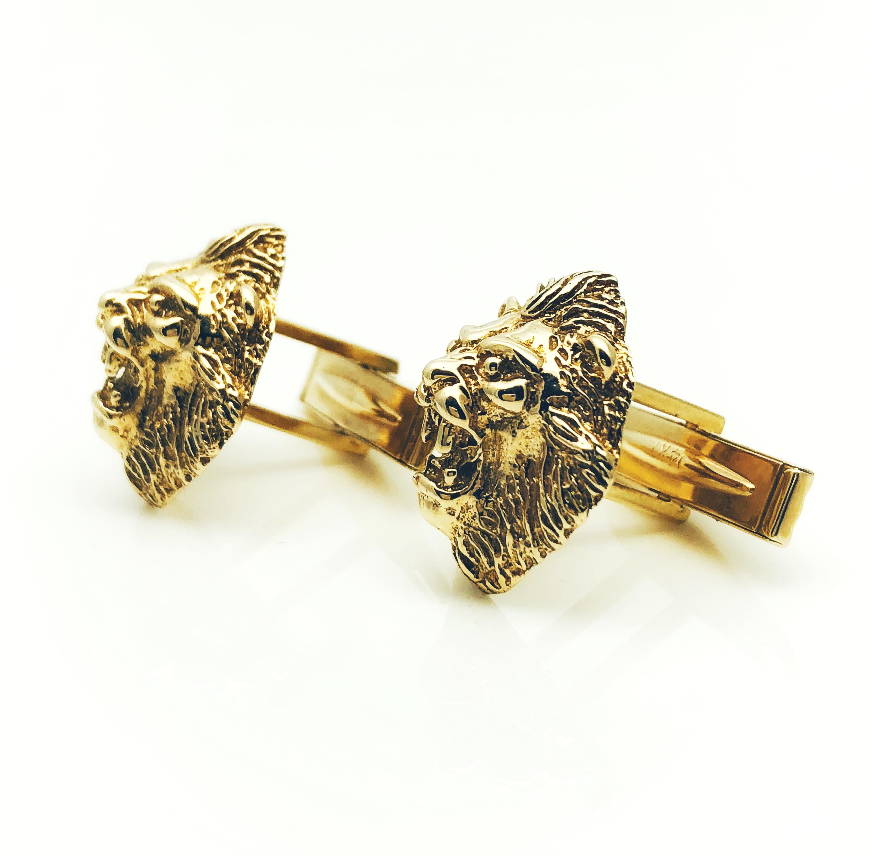 These Vintage Lion's Head Cufflinks are just stunning. They depict the face of a fiercely growling lion. They are made in 14k yellow gold, measure 3/4 inch by 5/8 inch and weigh 14.6 grams. These are beautifully crafted and detailed and would make a