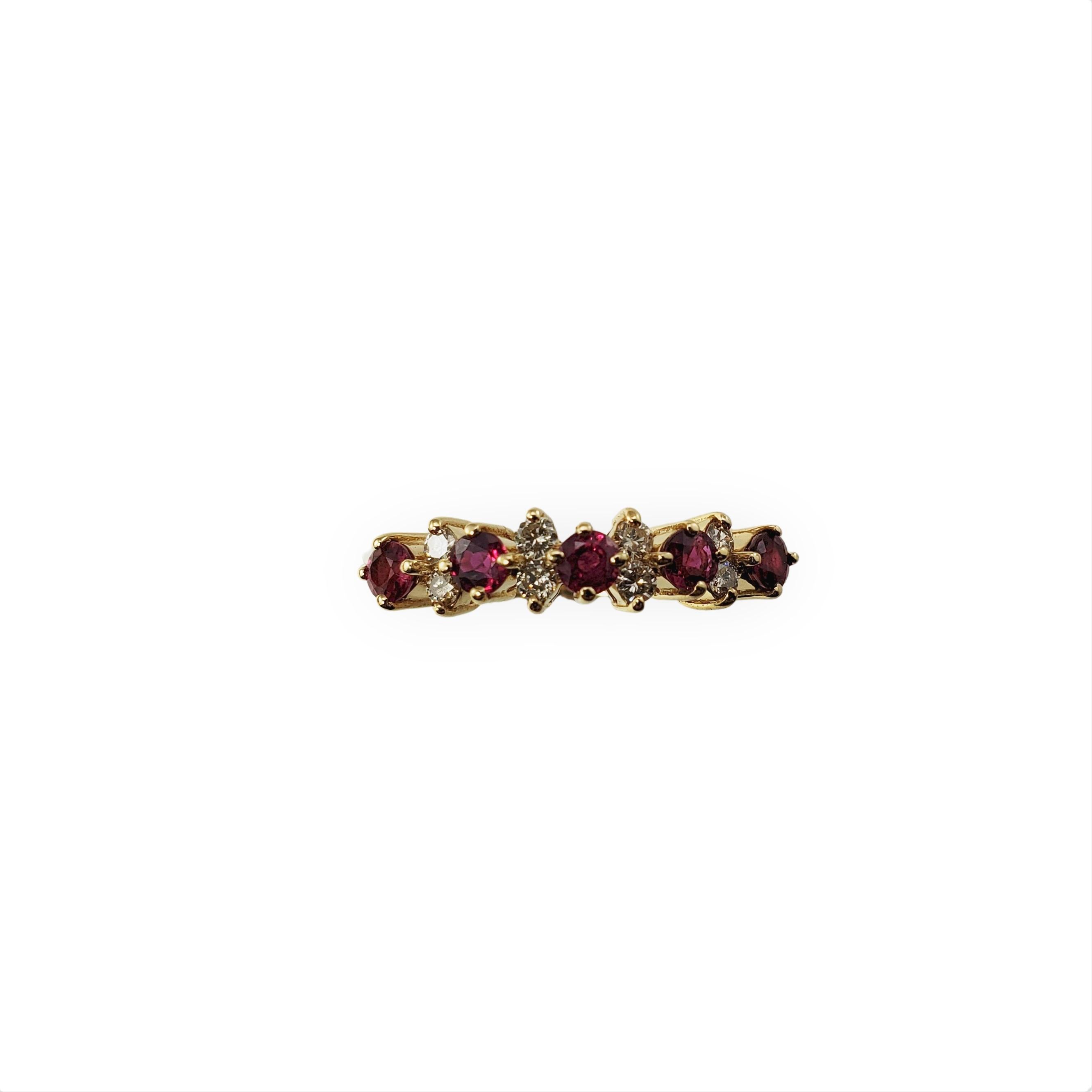 Vintage 14 Karat Yellow Gold Ruby and Diamond Ring Size 7-

This lovely ring features five round rubies and eight round brilliant cut diamond set in classic 14K yellow gold. Width: 5 mm.
Shank: 1.5 mm.

Approximate total diamond weight: .16