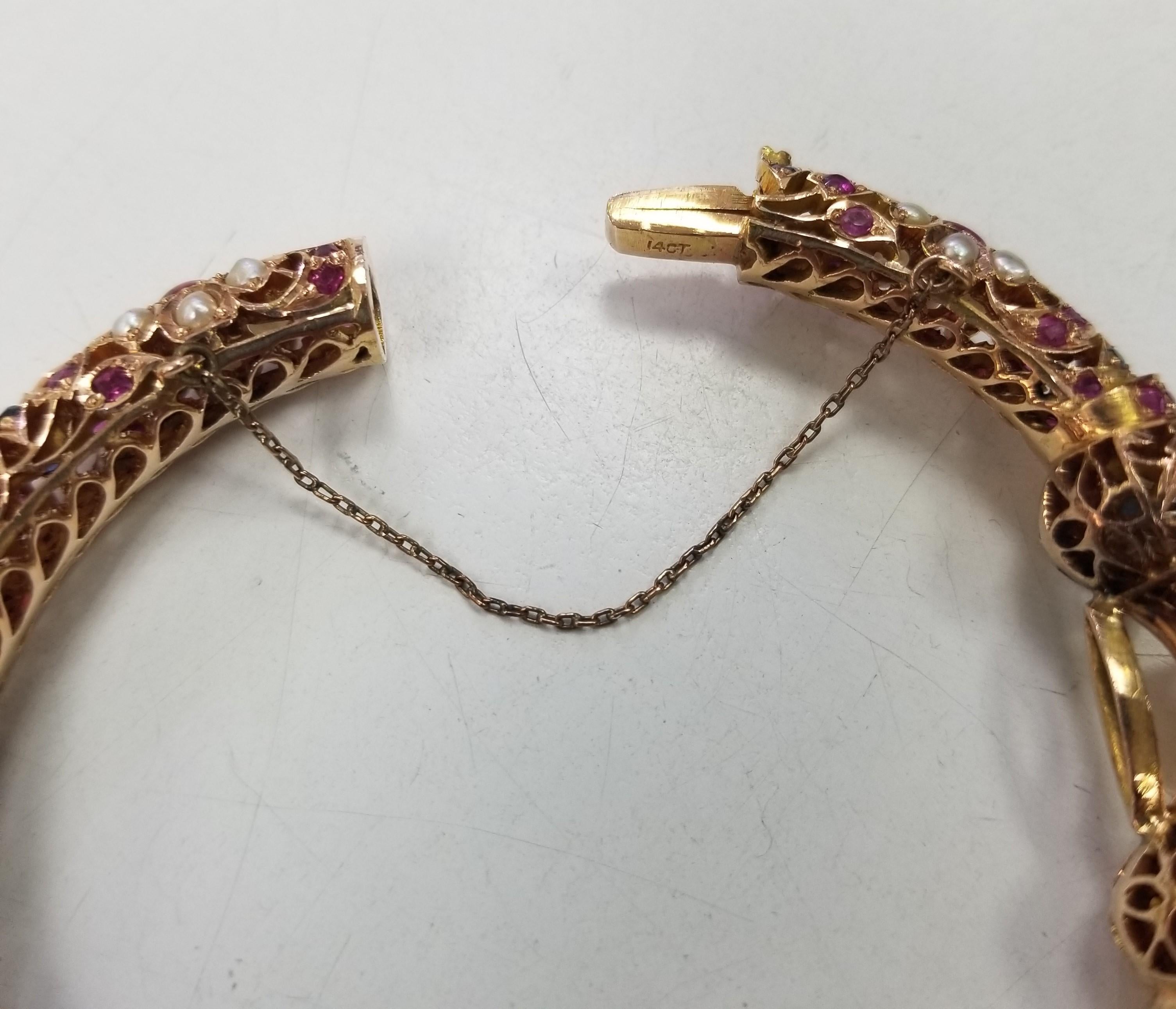 Vintage 14 Karat Yellow Gold Ruby, Sapphire and Pearl Bangle form the 