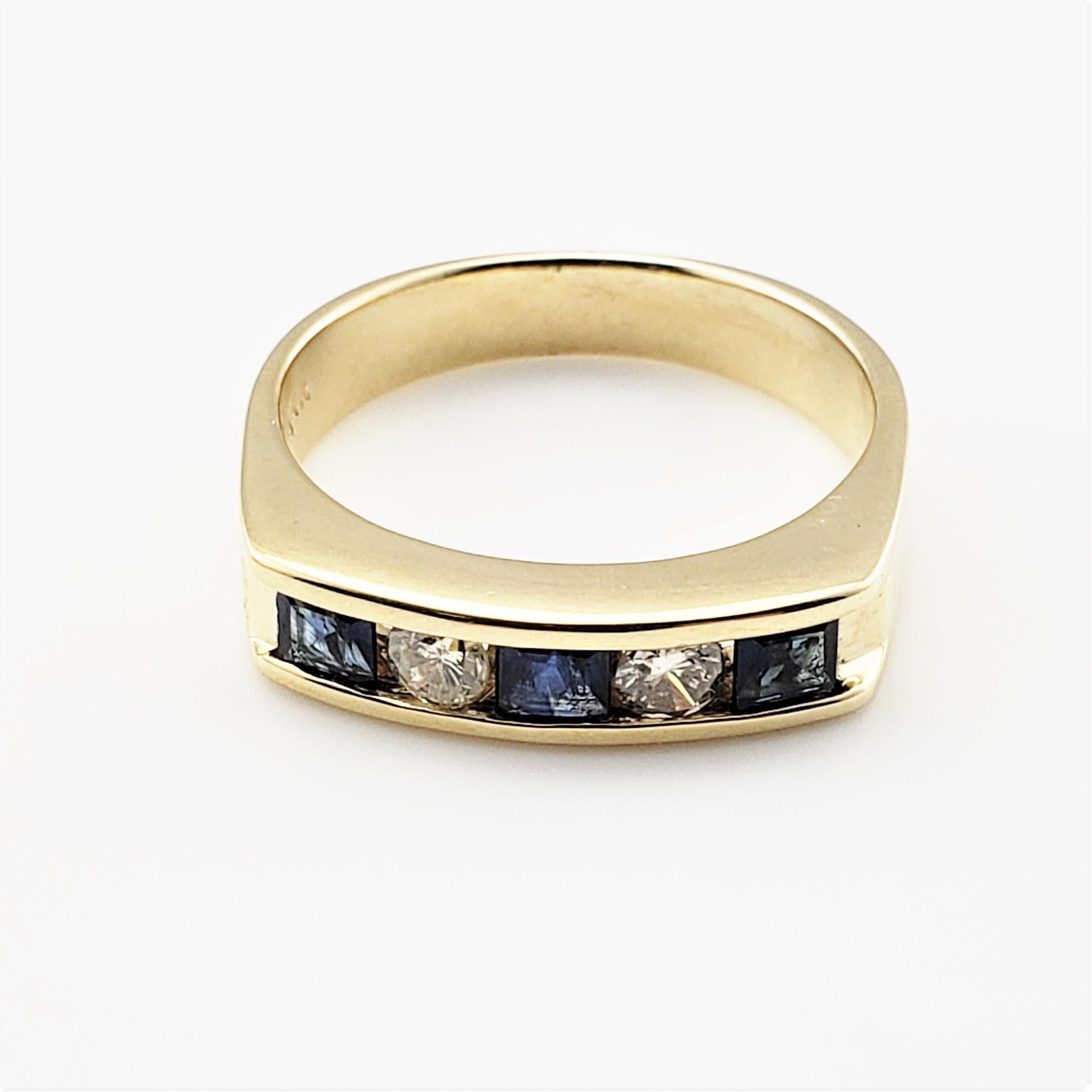 14 Karat Yellow Gold Sapphire and Diamond Ring Size 6.25 GAI Certified-

This stunning ring features three round sapphires and two round brilliant cut diamonds set in classic 14K yellow gold. Width: 4 mm.
Shank: 3 mm.

Total sapphire weight: .33