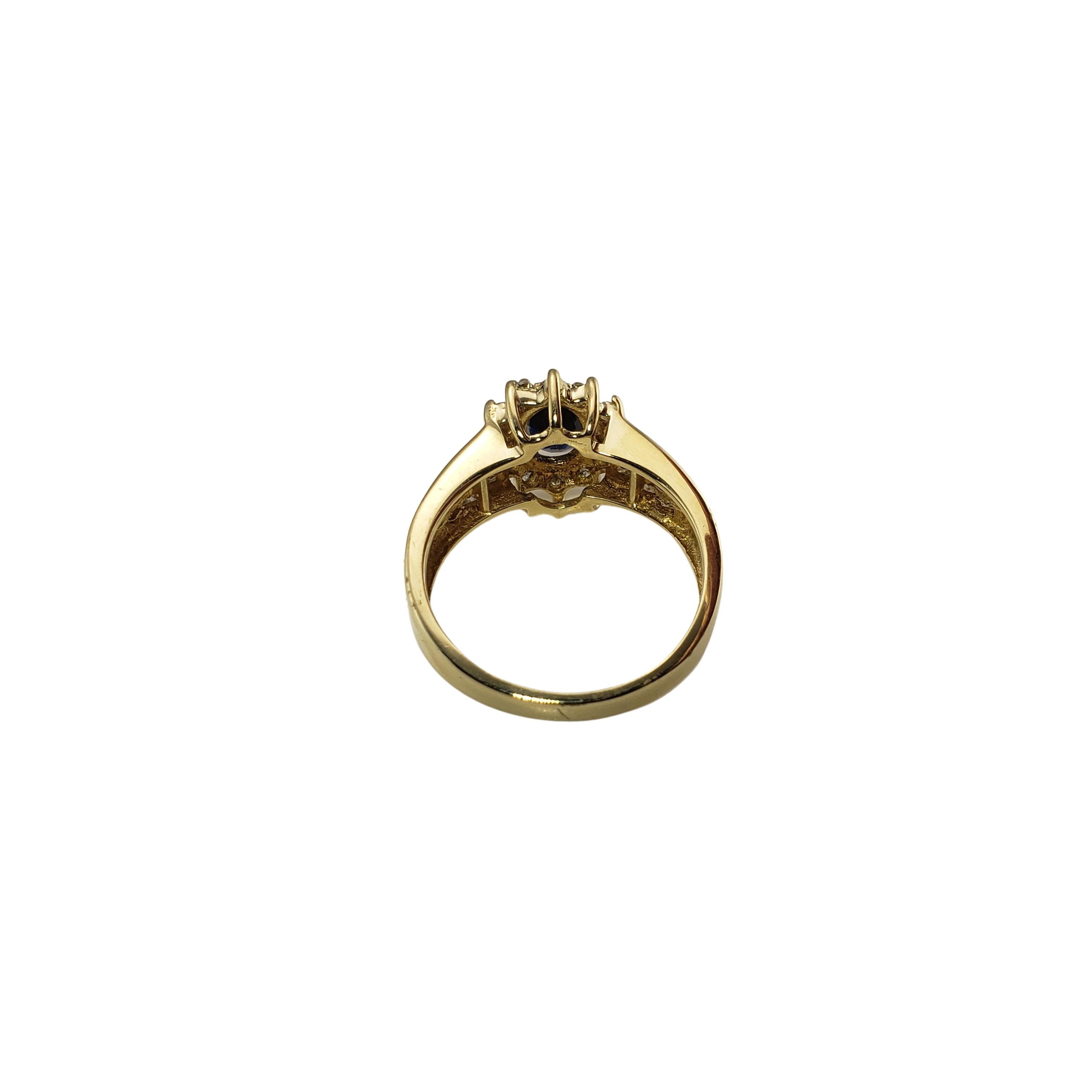 Vintage 14 Karat Yellow Gold Sapphire and Diamond Ring Size 7-

This lovely ring features one oval sapphire (7 mm x 5 mm) accented with 24 round brilliant cut diamonds set in classic 14K yellow gold. Width: 11 mm. Shank: 2 mm.

Approximate total