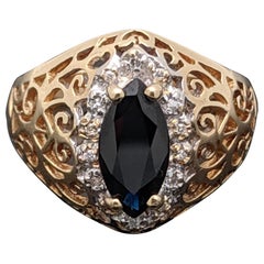 Vintage 14 Karat Yellow Gold Sapphire and Diamonds Ring
