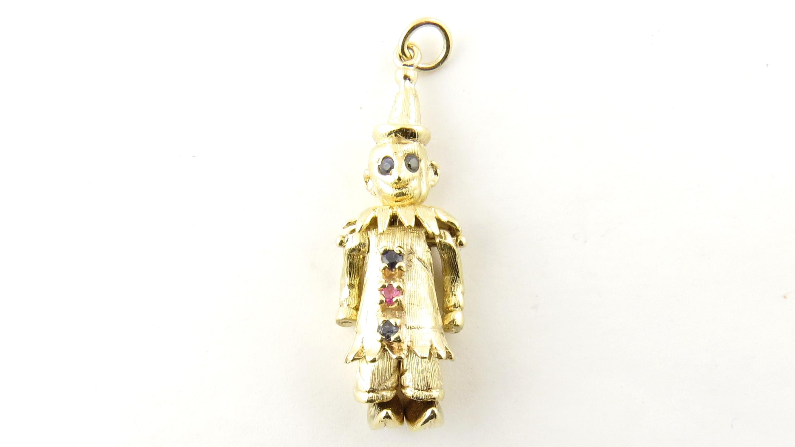 Vintage 14 Karat Yellow Gold Sapphire, Pearl and Ruby Articulated Clown Pendant.

This lovely pendant features an articulated clown accented with four sapphires, two pearls and one ruby set in meticulously detailed 14K yellow gold.

Size: 35 mm x 10