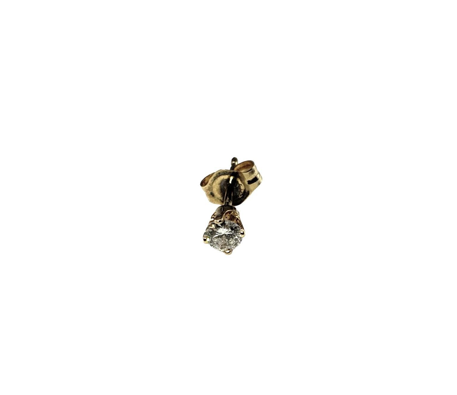 Vintage 14 Karat Yellow Gold Single Diamond Stud Earring-

This sparkling single stud earring features one round brilliant cut diamond set in classic 14K yellow gold.  Push back closure.

Approximate total diamond weight: .13 ct.

Diamond color: 