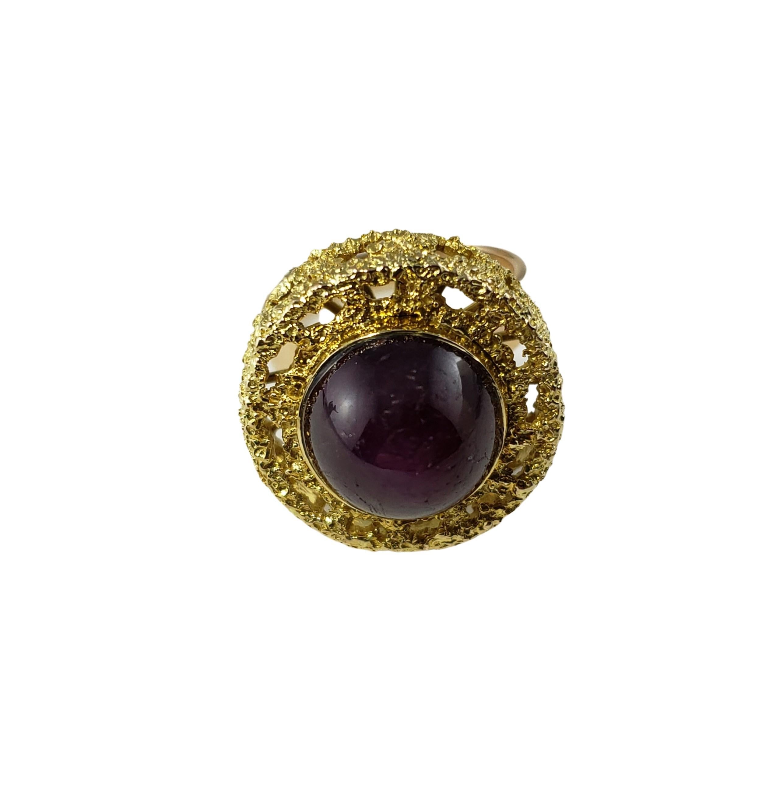 14 Karat Yellow Gold Star Ruby Ring Size 7.75 GAI Certified-

This stunning ring features one round cabochon purple star ruby (12 mm) set in beautifully detailed 14K yellow gold. Width: 21 mm.
Height: 17 mm. Shank: 3.5 mm.

Ruby weight: 14 ct.

Ring