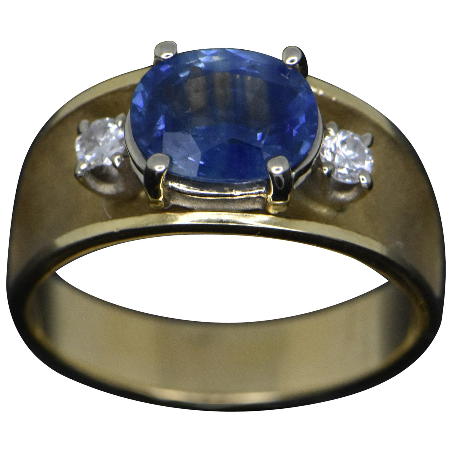 Vintage 14 Karat Yellow Gold with Blue Sapphire and Diamonds Ring For Sale