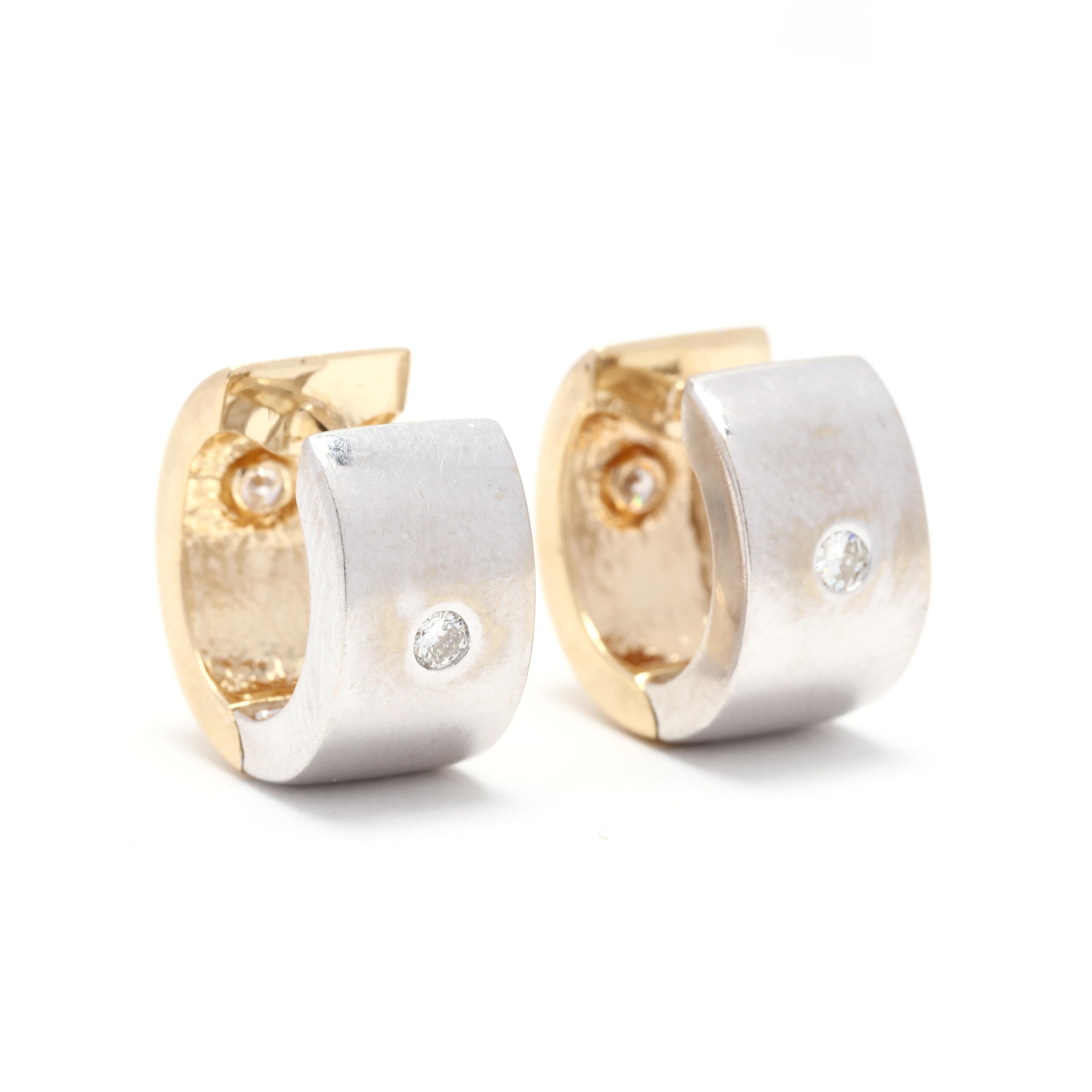 Vintage 14 karat yellow and white gold diamond huggie hoops. These hoops features abi color gold design with each side set with a flush set diamond weighing approximately .16 total carats and with a snap closure.



Stones:

- diamonds, 4 stones

-